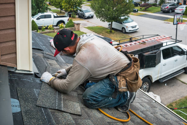 Professional Roofing technician working in Hamshire, TX